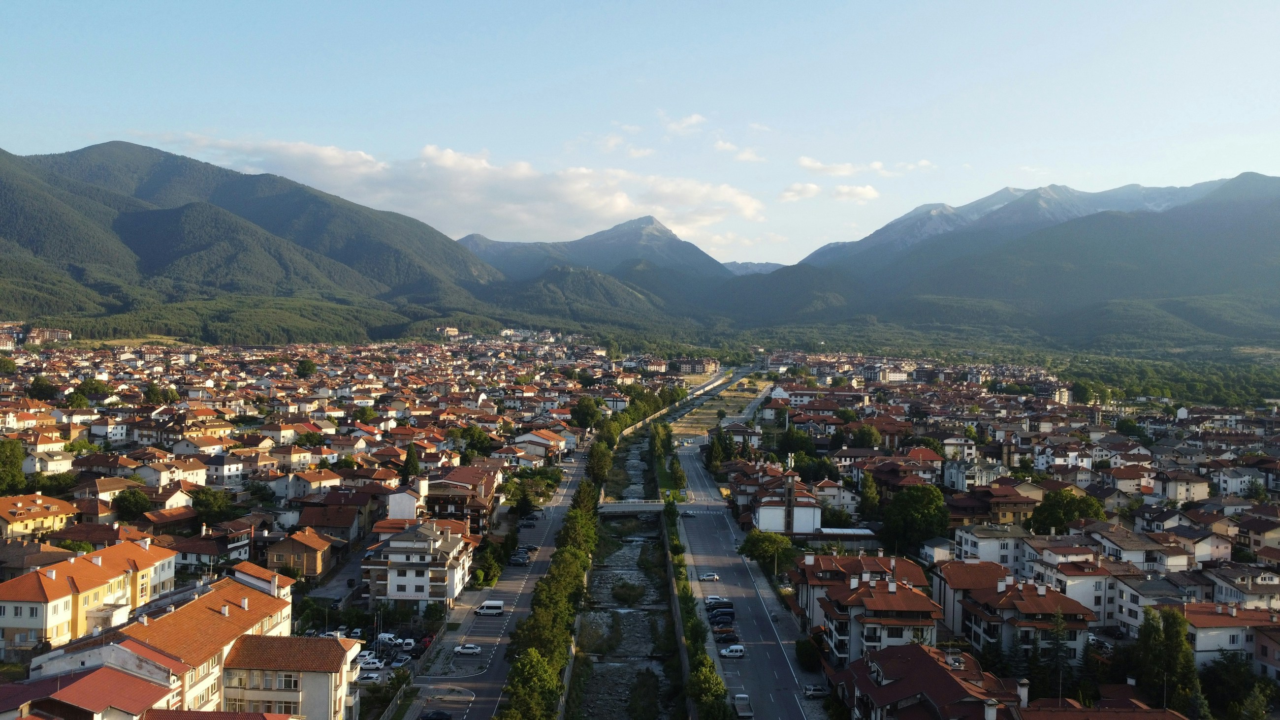 Aerial view of Bansko with the Pirin Mountains behind the town